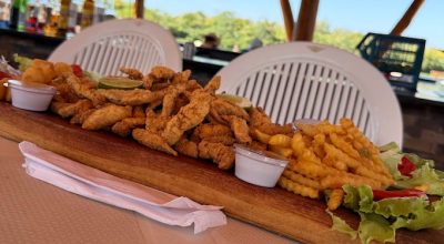 Um quilo de til&aacute;pia e drinks especiais para curtir a Praia da Figueira
