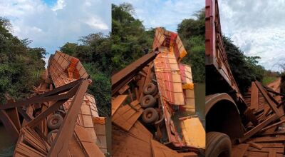 Carreta carregada de milho tomba ap&oacute;s ponte de madeira ceder em MS