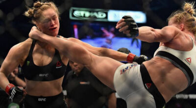 Com um nocaute espetacular, Holly Holm apaga Ronda e &eacute; a nova campe&atilde; peso-galo do UFC