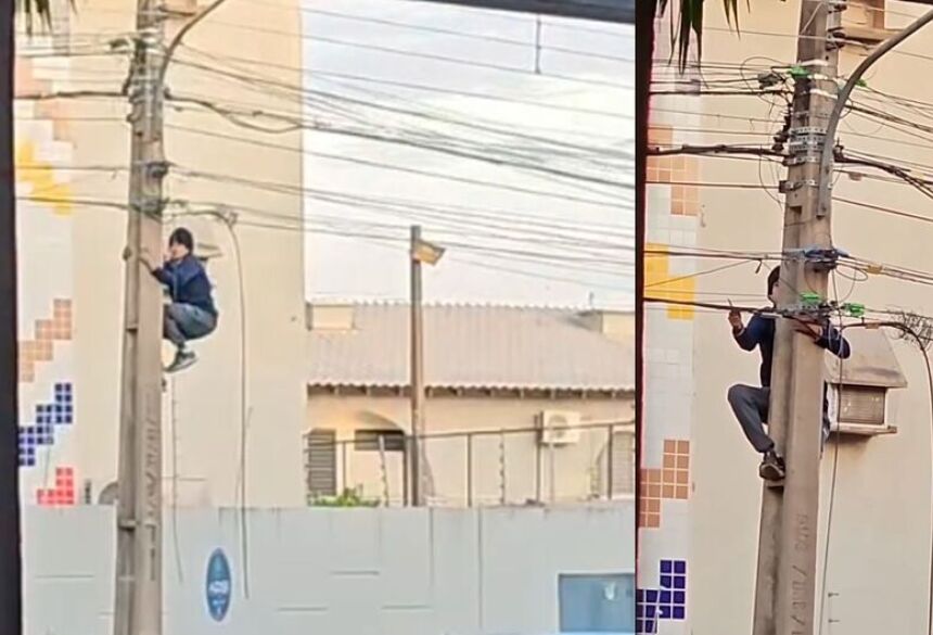 Depois de ter sucesso, o homem desce escorregando pela estrutura e foge ao perceber que estava sendo filmado